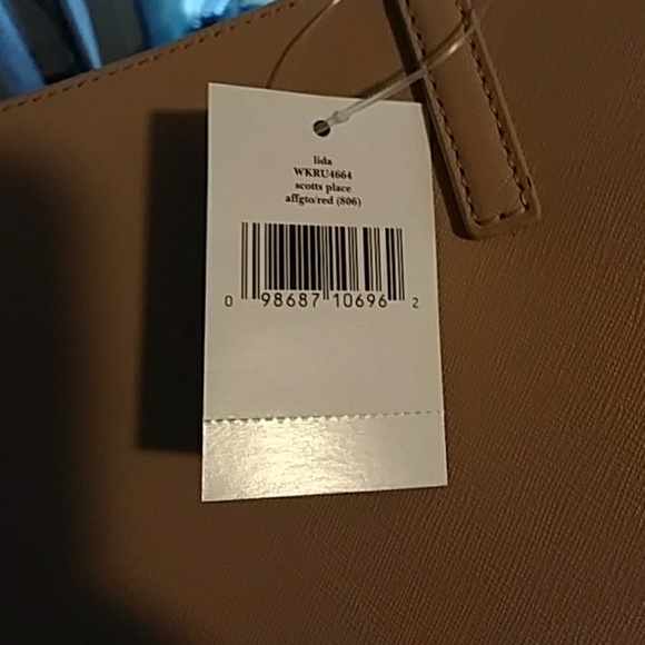 Beige in color Kate Spade zippered purse - Picture 5 of 5